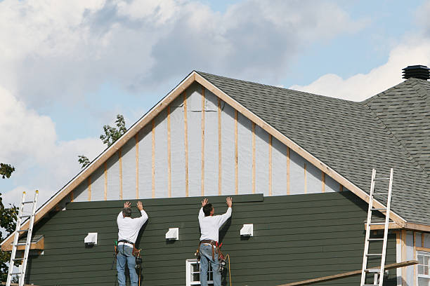 Professional Siding Installation technician working in Stevensville, MD